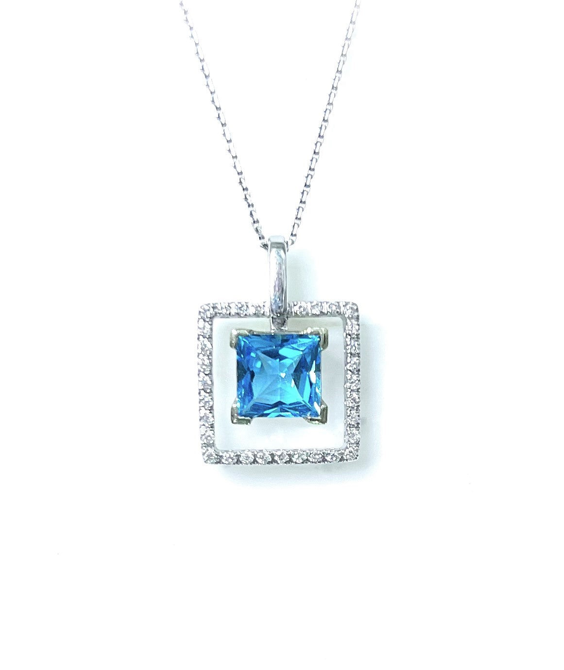 Blue Topaz and Diamond Pendant